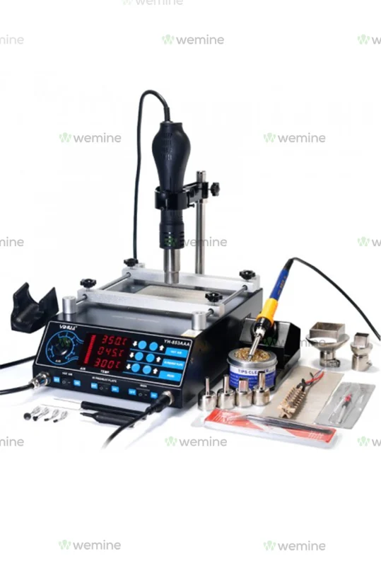 Digital Wemine soldering and rework station with various soldering tips, wire spool, and precision tools for electronic repairs.
